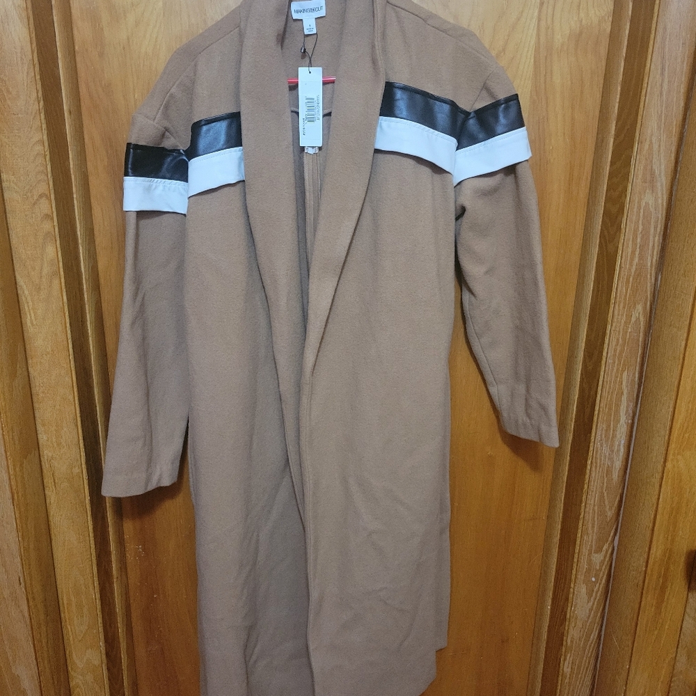 Chic Tan Coat with Black and White Accents